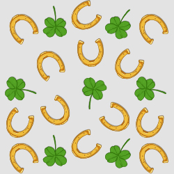 four leaved clovers and horseshoes to symbolize the luck
